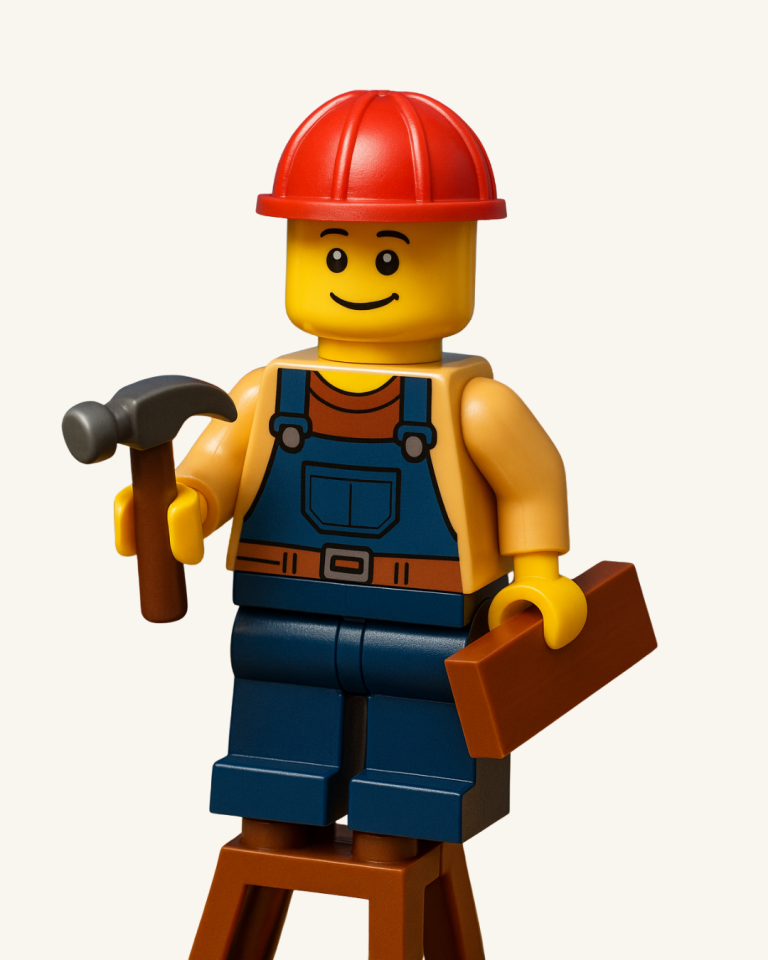 LEGO® figure in overalls holding a hammer and timber block, representing the Builder role in LEGO® Based Play Therapy.